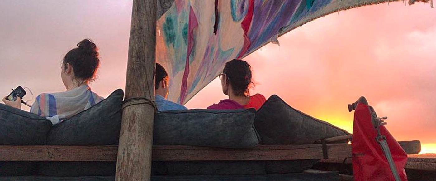 people enjoying a sunset cruise near Lamu in Kenya