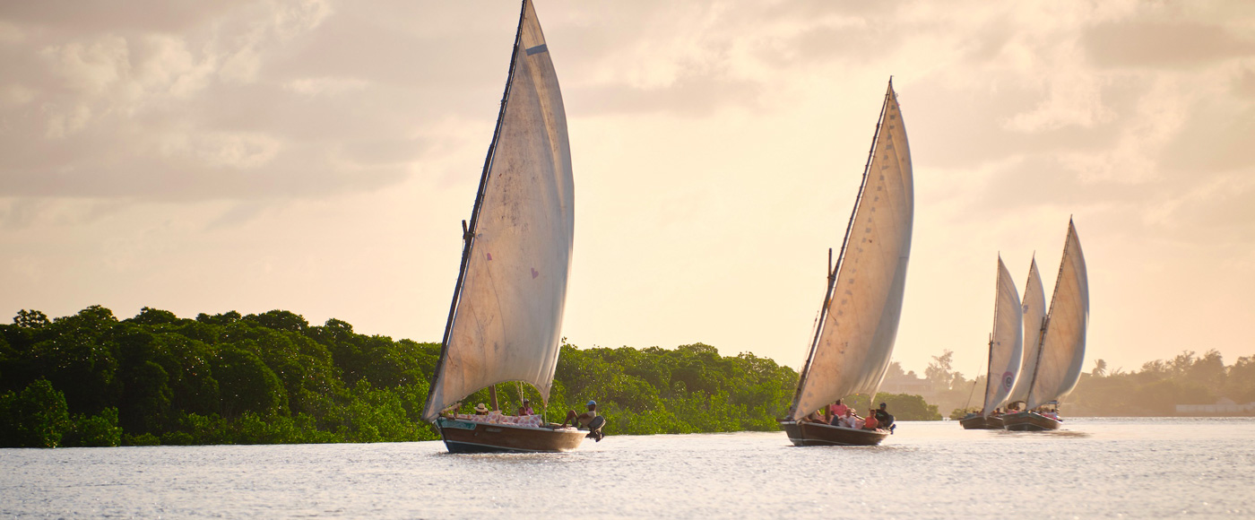 dhow boats sailing on the Indian Ocean near Lamu in Kenya